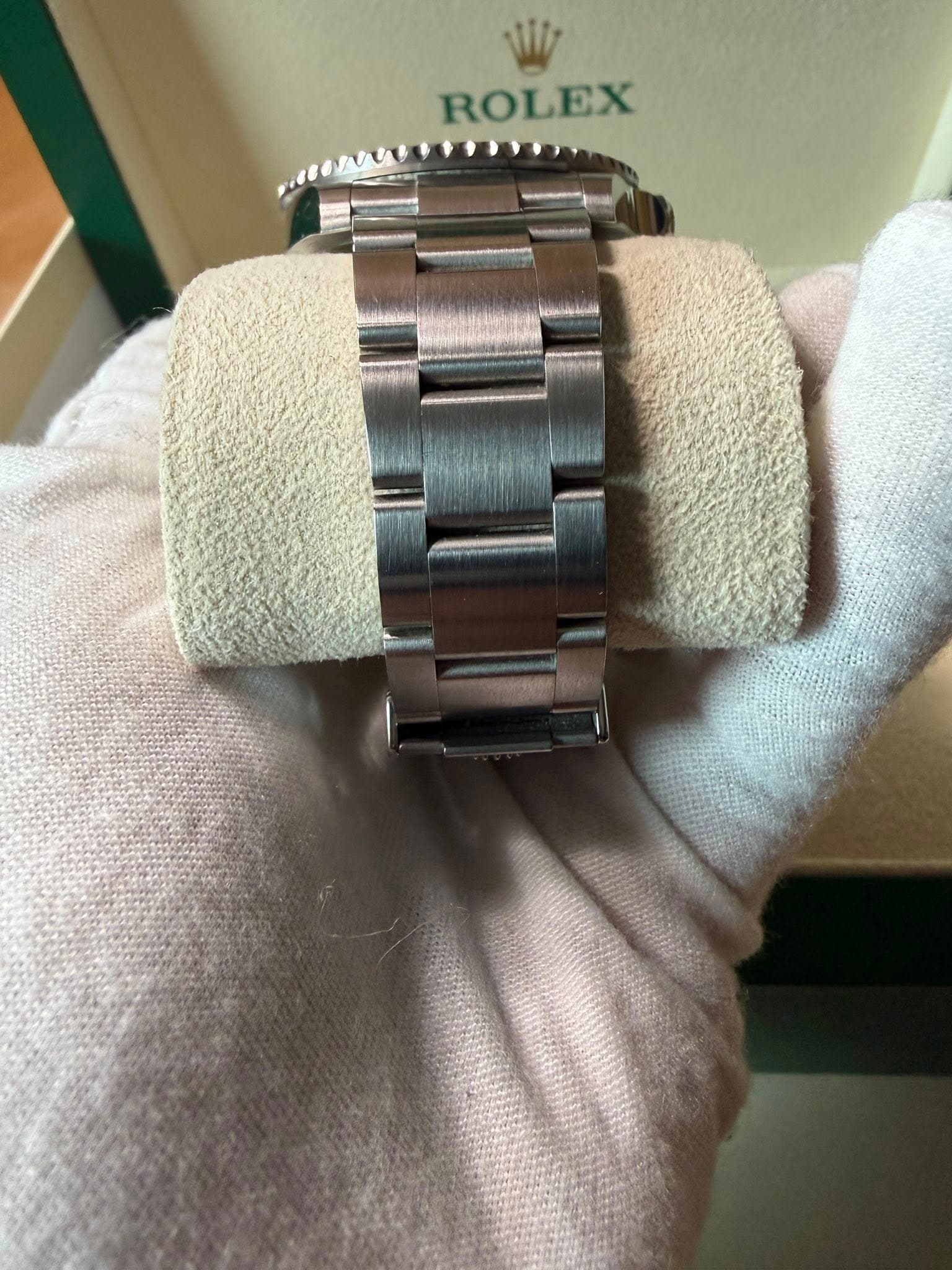 May be an image of wrist watch and text that says 'ROLEX'