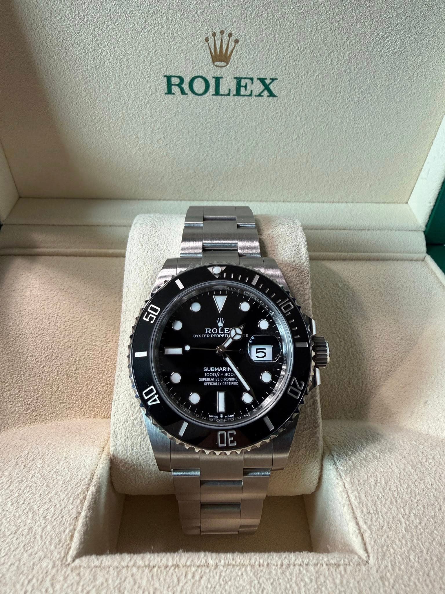 May be an image of wrist watch and text that says 'ROLEX 50 ROLE RPERPE 5 5 GUBMAR 40 30'