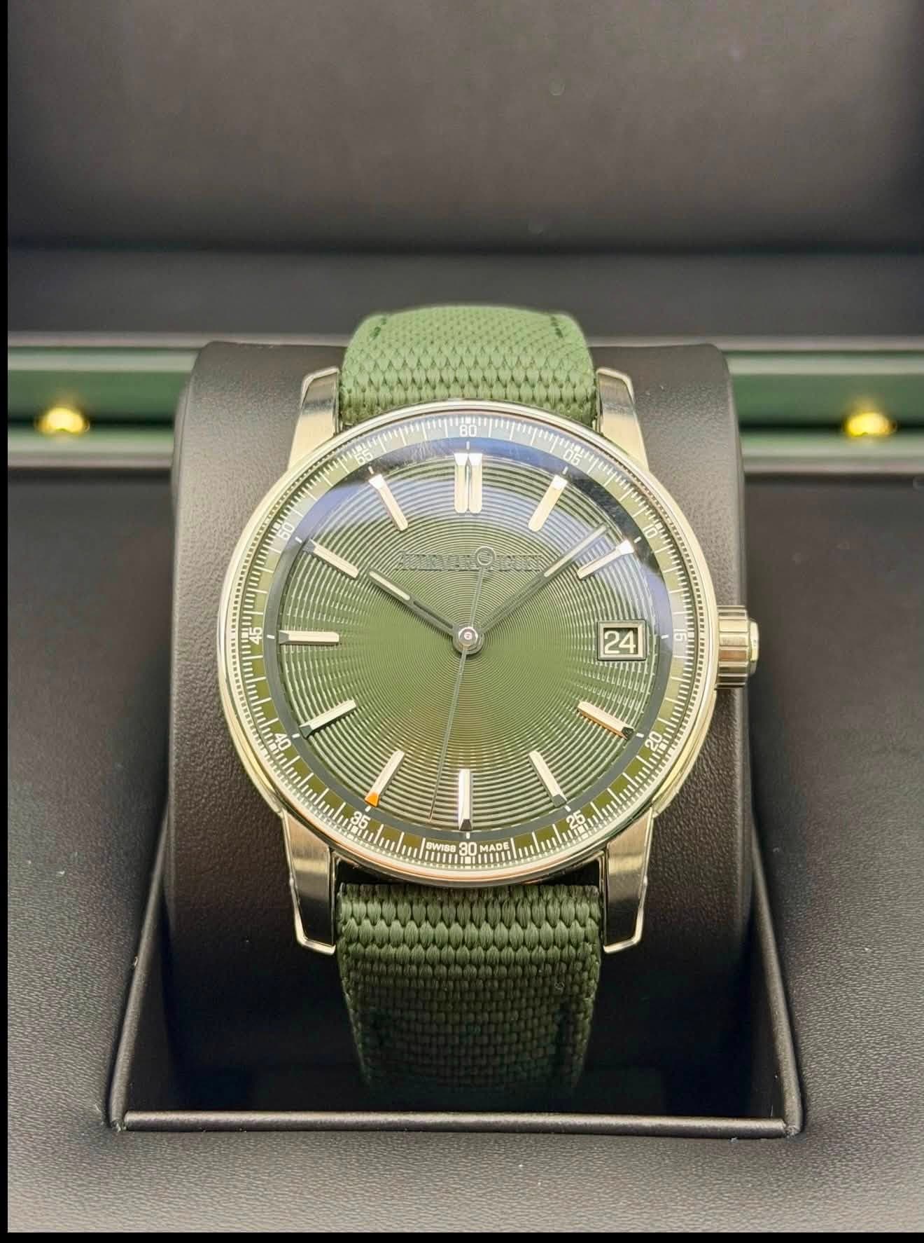 May be an image of wrist watch and text