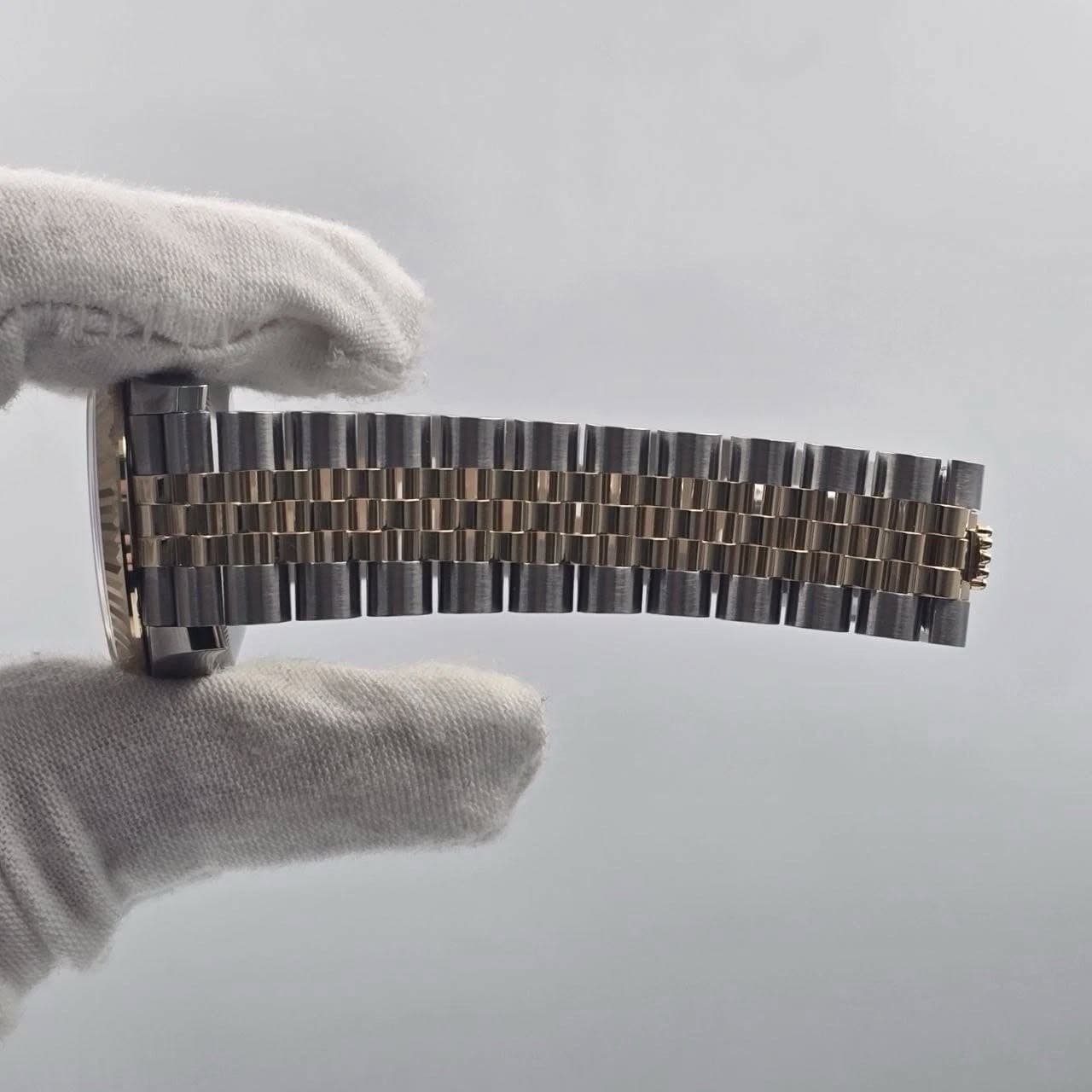 May be an image of wrist watch