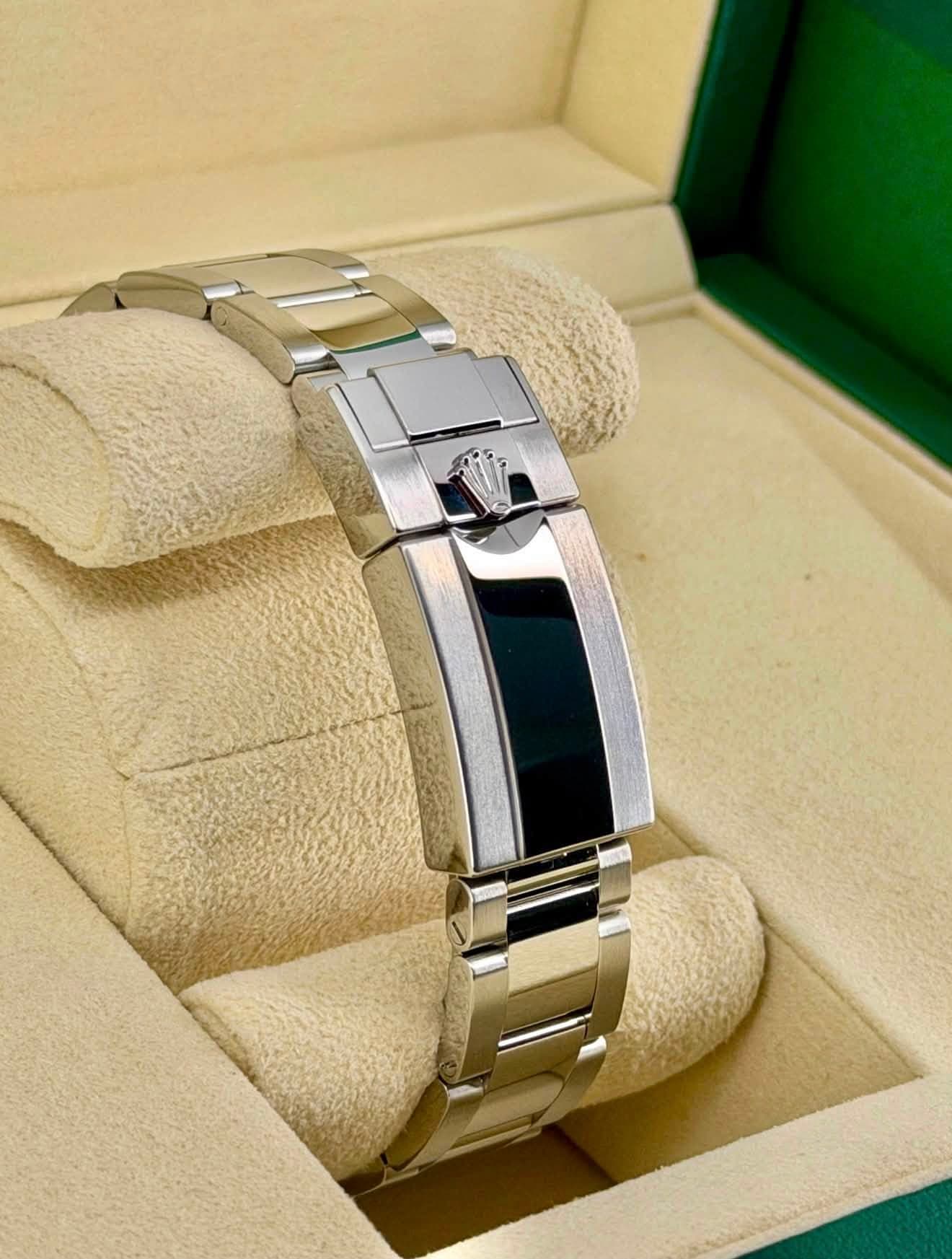 May be an image of wrist watch and jewelry