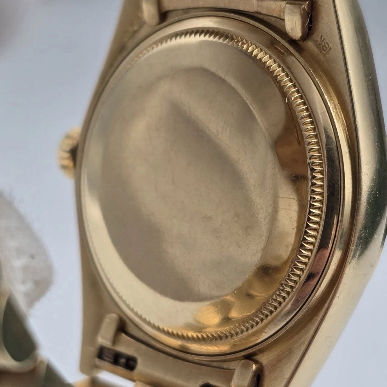 May be an image of wrist watch