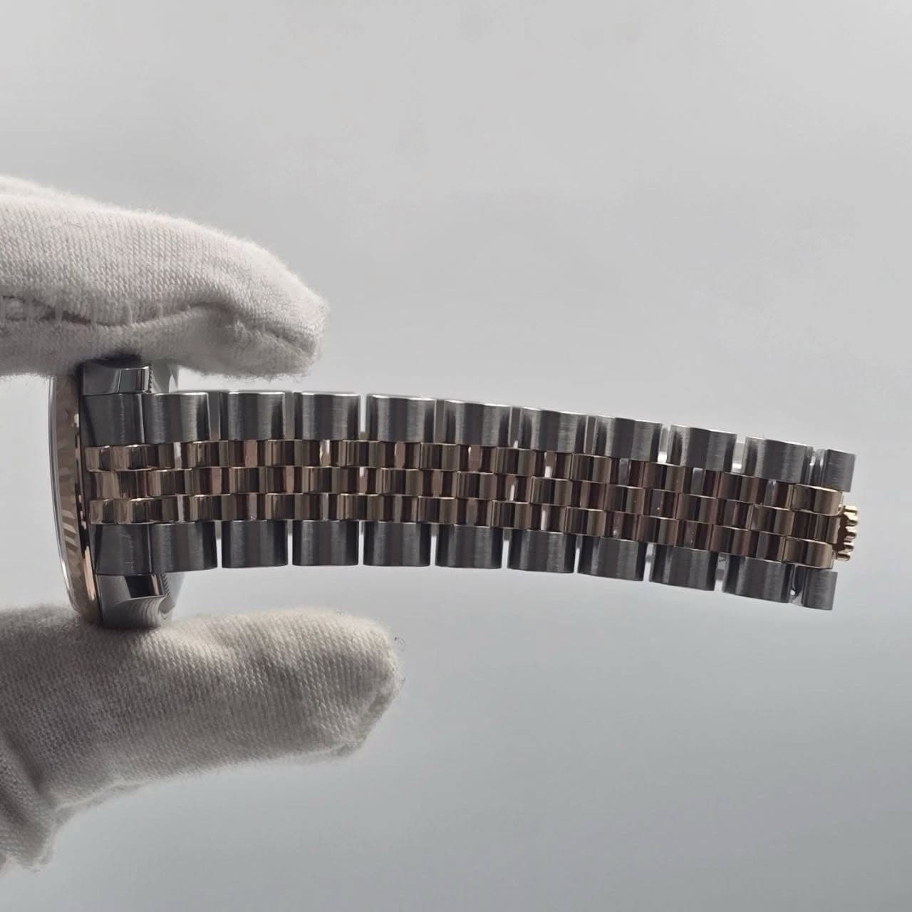 May be an image of wrist watch