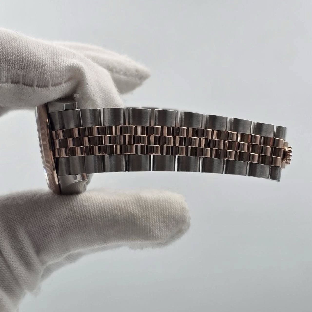 May be an image of wrist watch