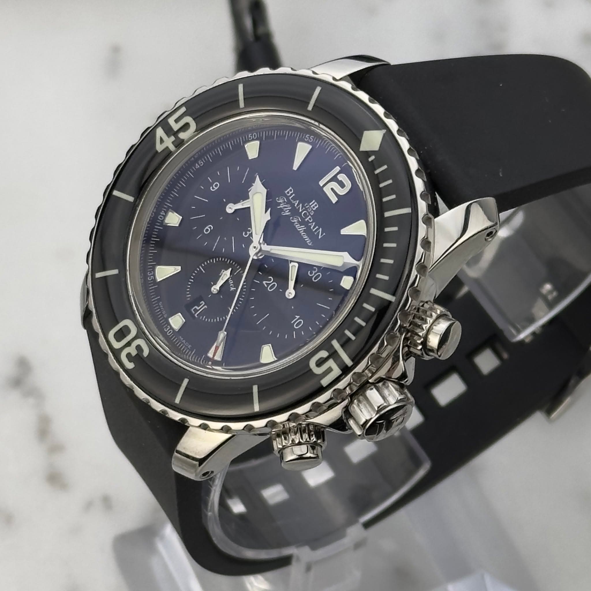 May be an image of wrist watch and text that says '150 2 45 5i و 3 Fifly ι LANCPAIN JB 12 Fathoms NCPAIN 30 20 سن 30 10 15 鹿ビ乳.'