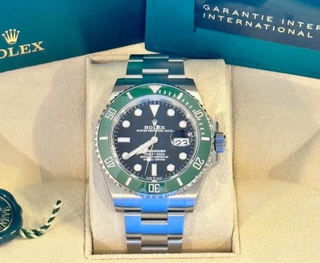 May be an image of wrist watch and text