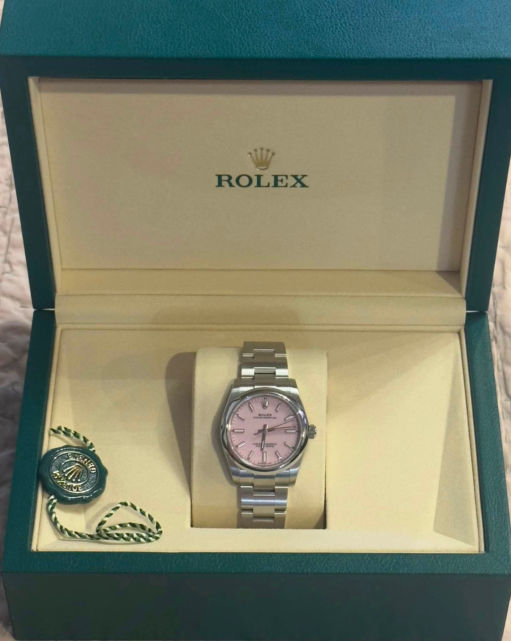 May be an image of wrist watch and text