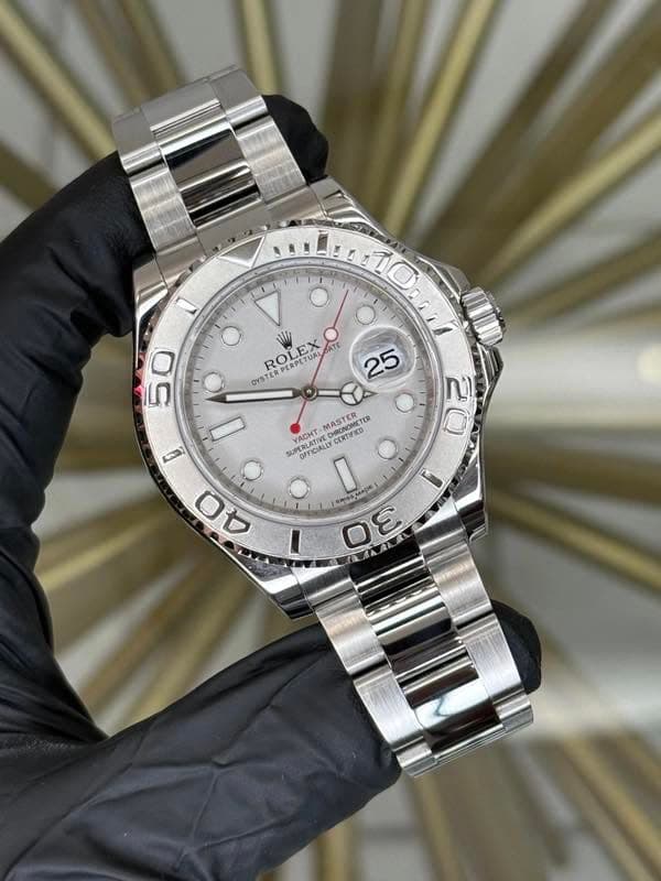 May be an image of wrist watch and text that says '10 ١ ONI O ROLEX 50 PERPETUAL EX ROMETUAL DATE OYSTER 25 MASTER DRLNOMSTES PRENOMETE ម SUPERLATIV PERLATIVE CEED CERTIFICO…