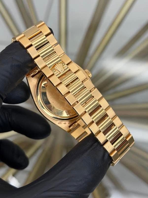 May be an image of wrist watch and text that says 'A'