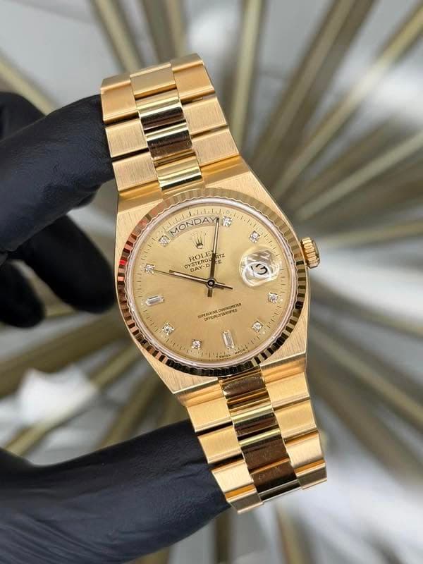May be an image of wrist watch and text