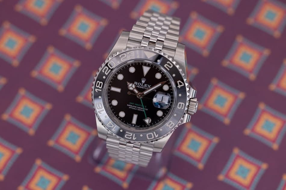 May be an image of wrist watch and text