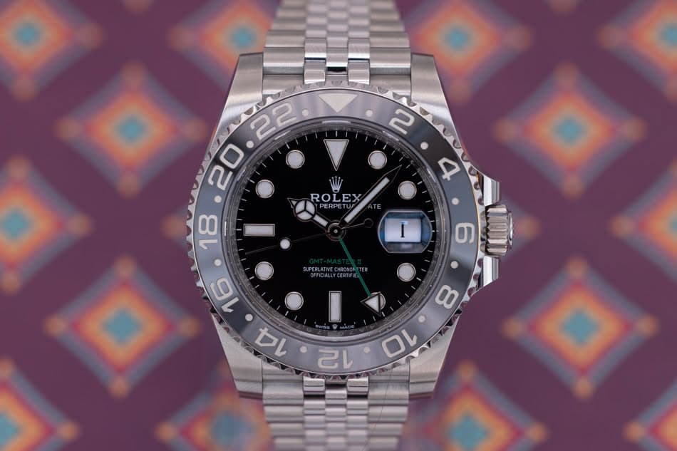 May be an image of wrist watch and text that says '2 ROLEX PERPET 4 I D '