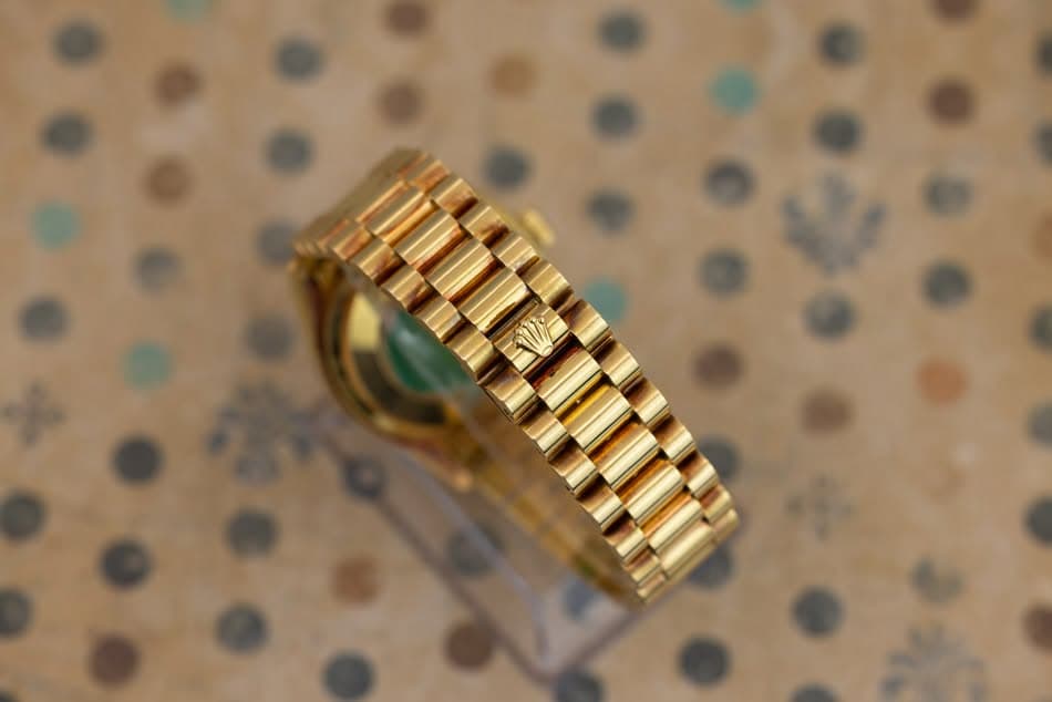 May be an image of wrist watch and jewelry