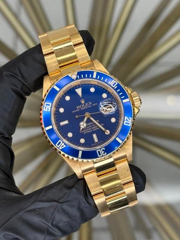 May be an image of wrist watch and text that says '10 50 ROLEX ROI PERPETUAL 2X DATE PERPETUAL OYSTER MAR +30 P CERTY 20 2 40 DE มร'