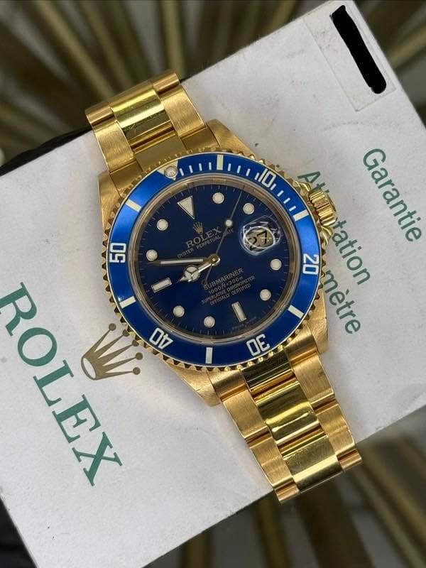 May be an image of wrist watch and text that says '10 Atimnntation At Garantie ា 20 tation mètre ٤ M 50 知OA ROLEX / 40'