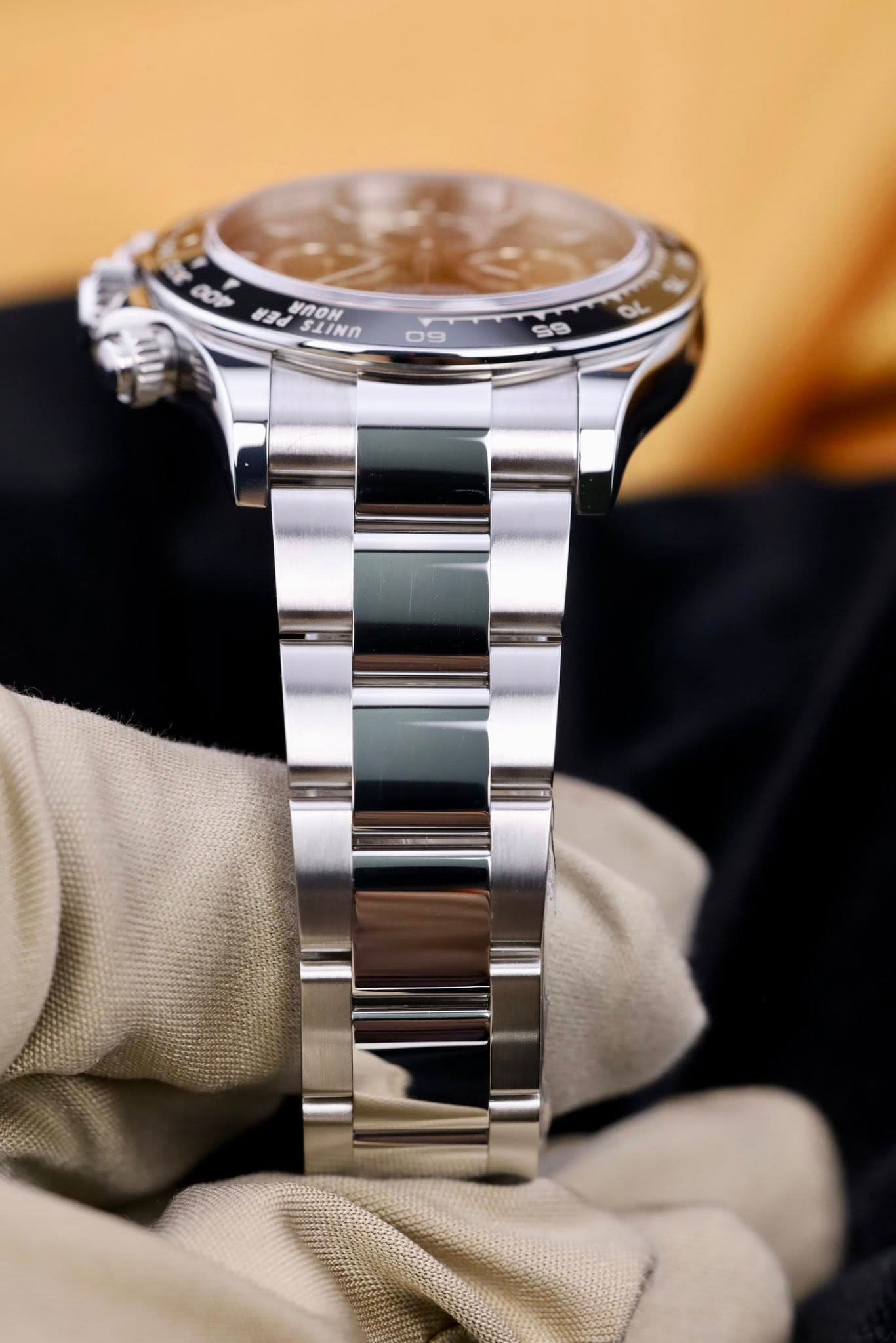 May be an image of wrist watch and text