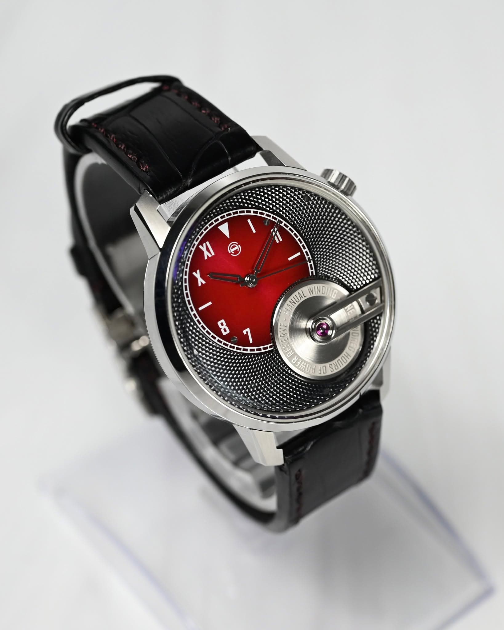 May be an image of wrist watch and text