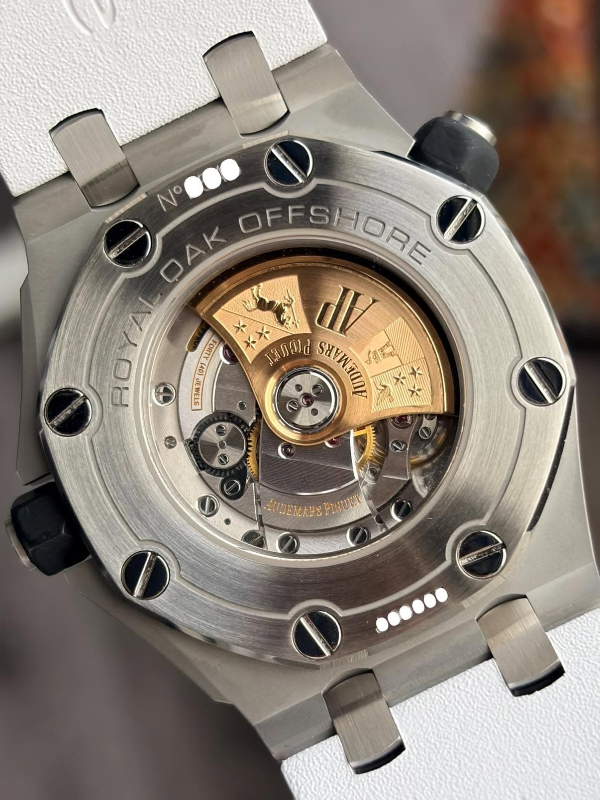 May be an image of wrist watch and text
