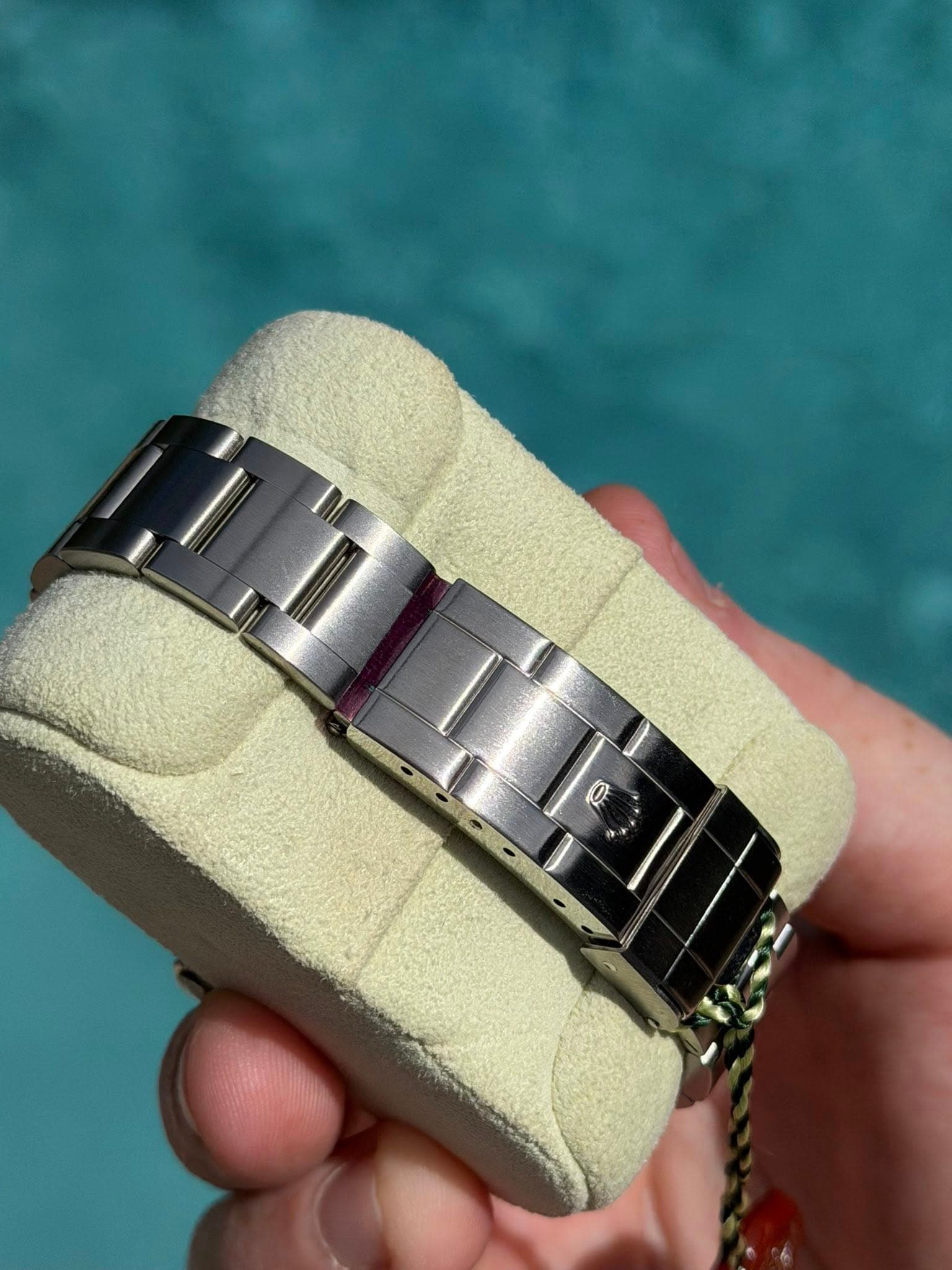 May be an image of wrist watch and jewelry