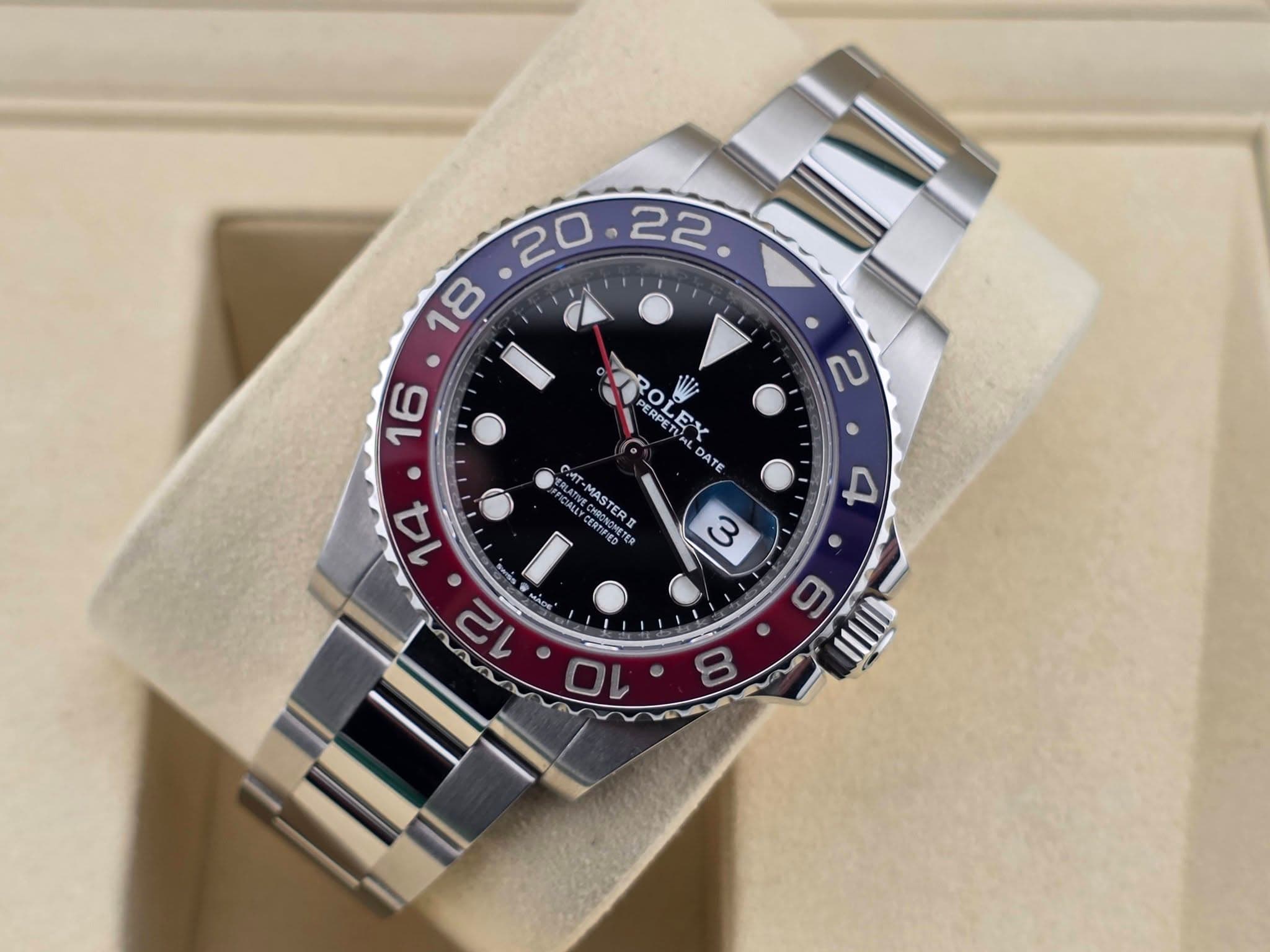 May be an image of wrist watch and text