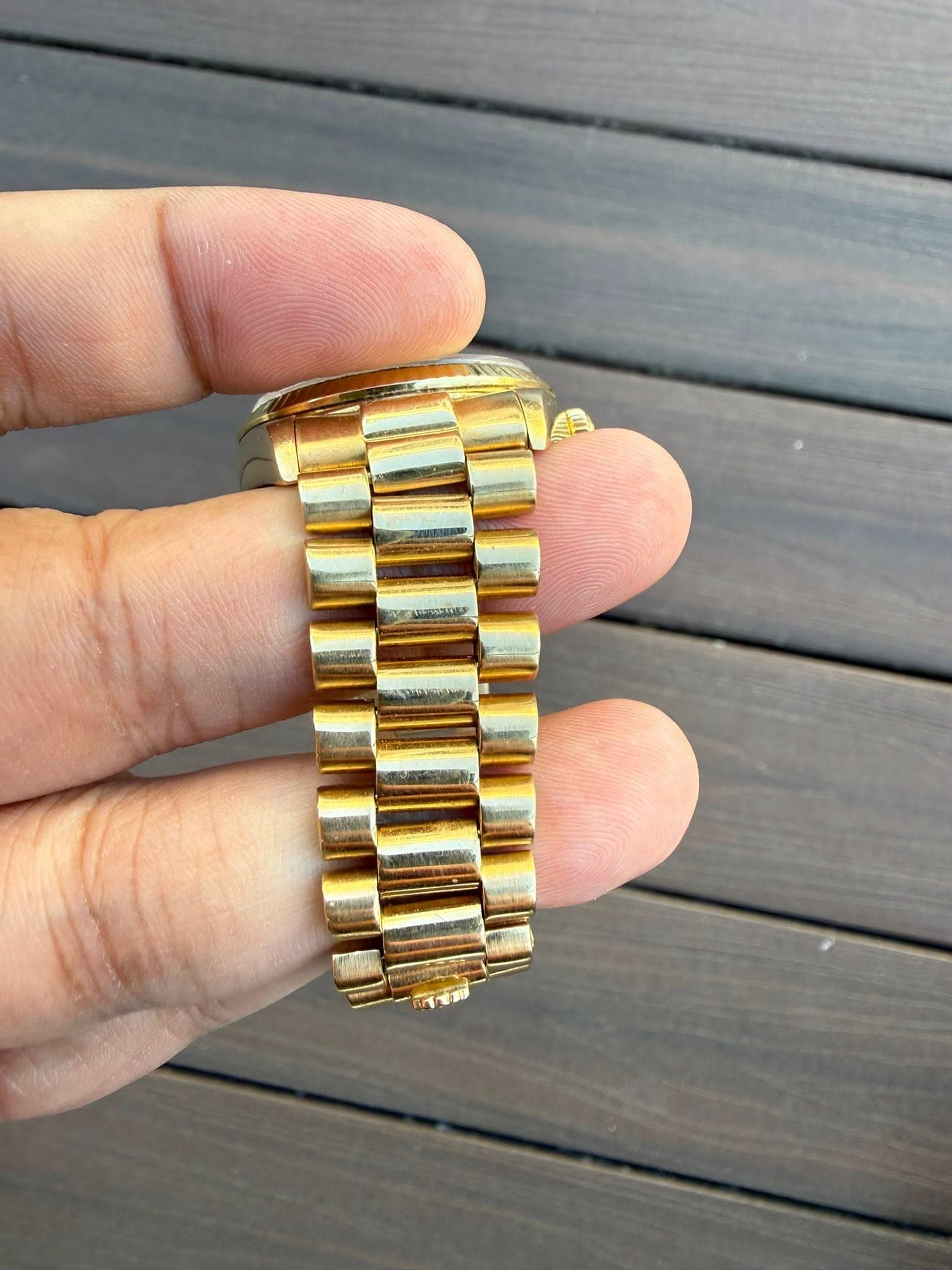 May be an image of wrist watch