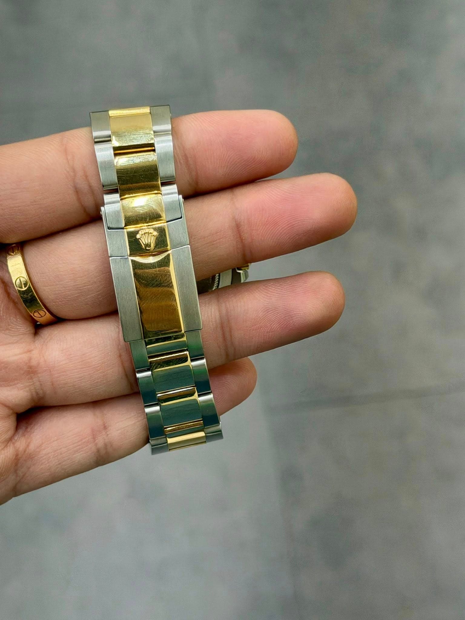 May be an image of wrist watch