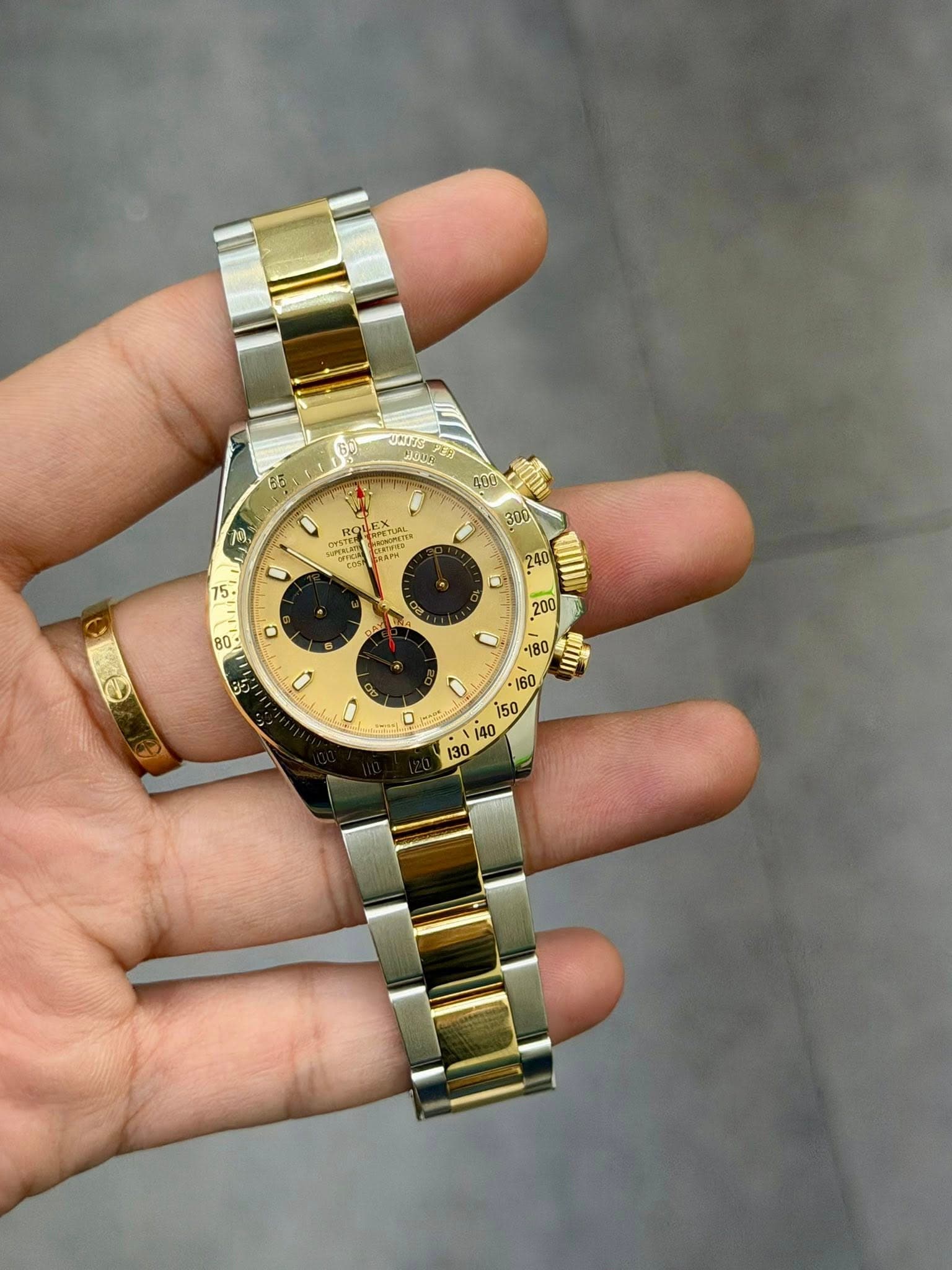 May be an image of wrist watch and text