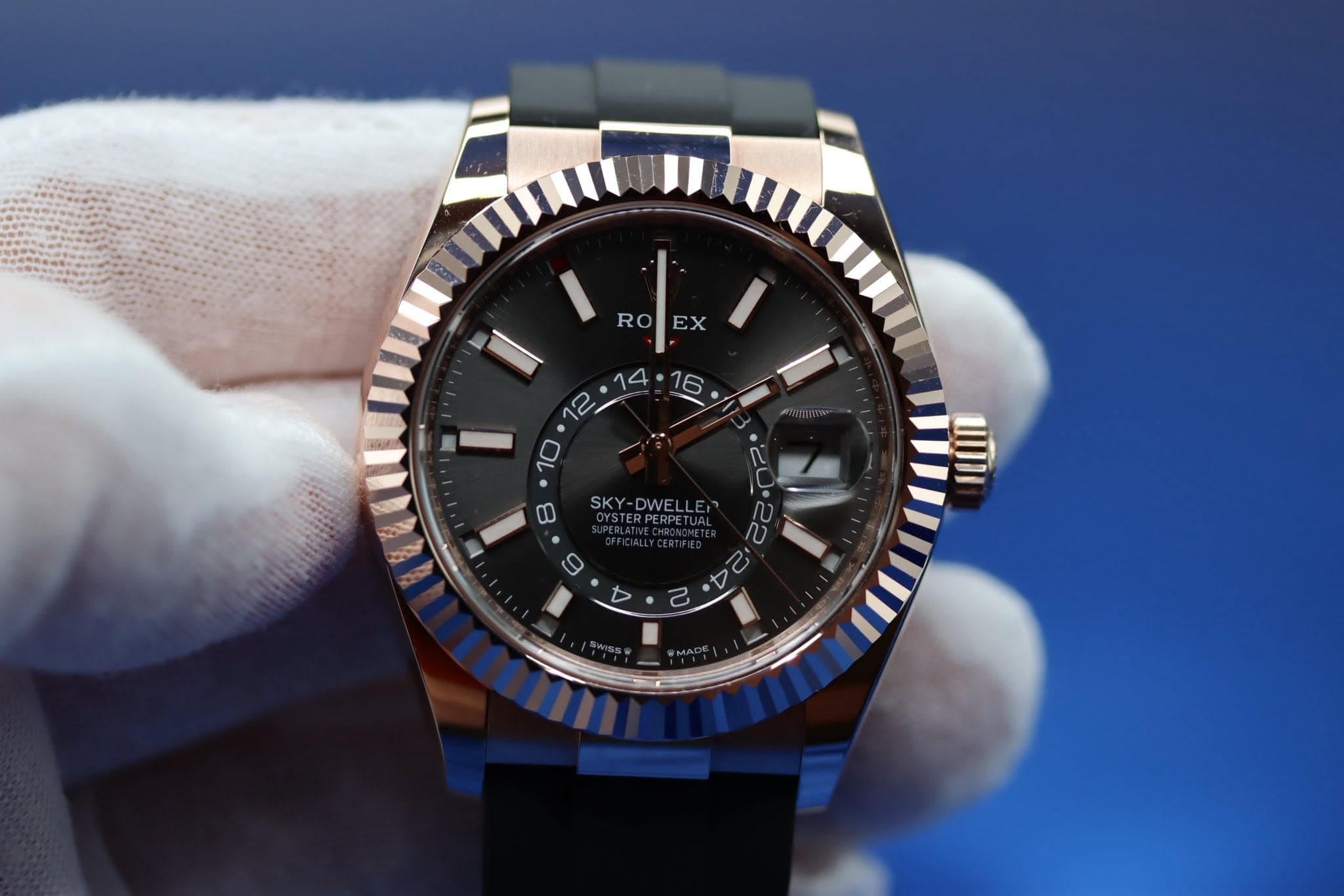 May be an image of wrist watch and text that says 'R EX 12.14: D0 I M SKY-DWELL ١۱'