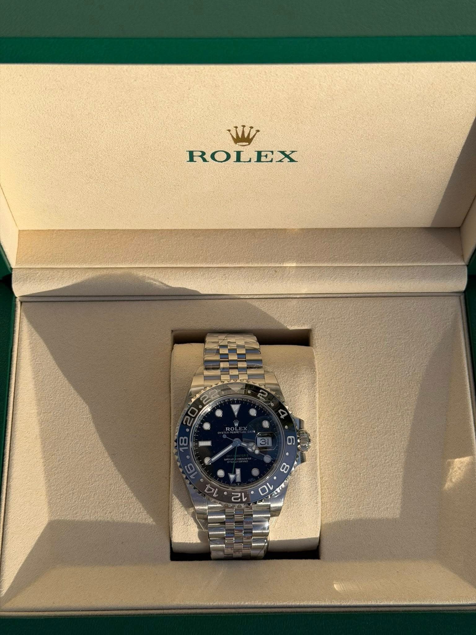 May be an image of wrist watch and text
