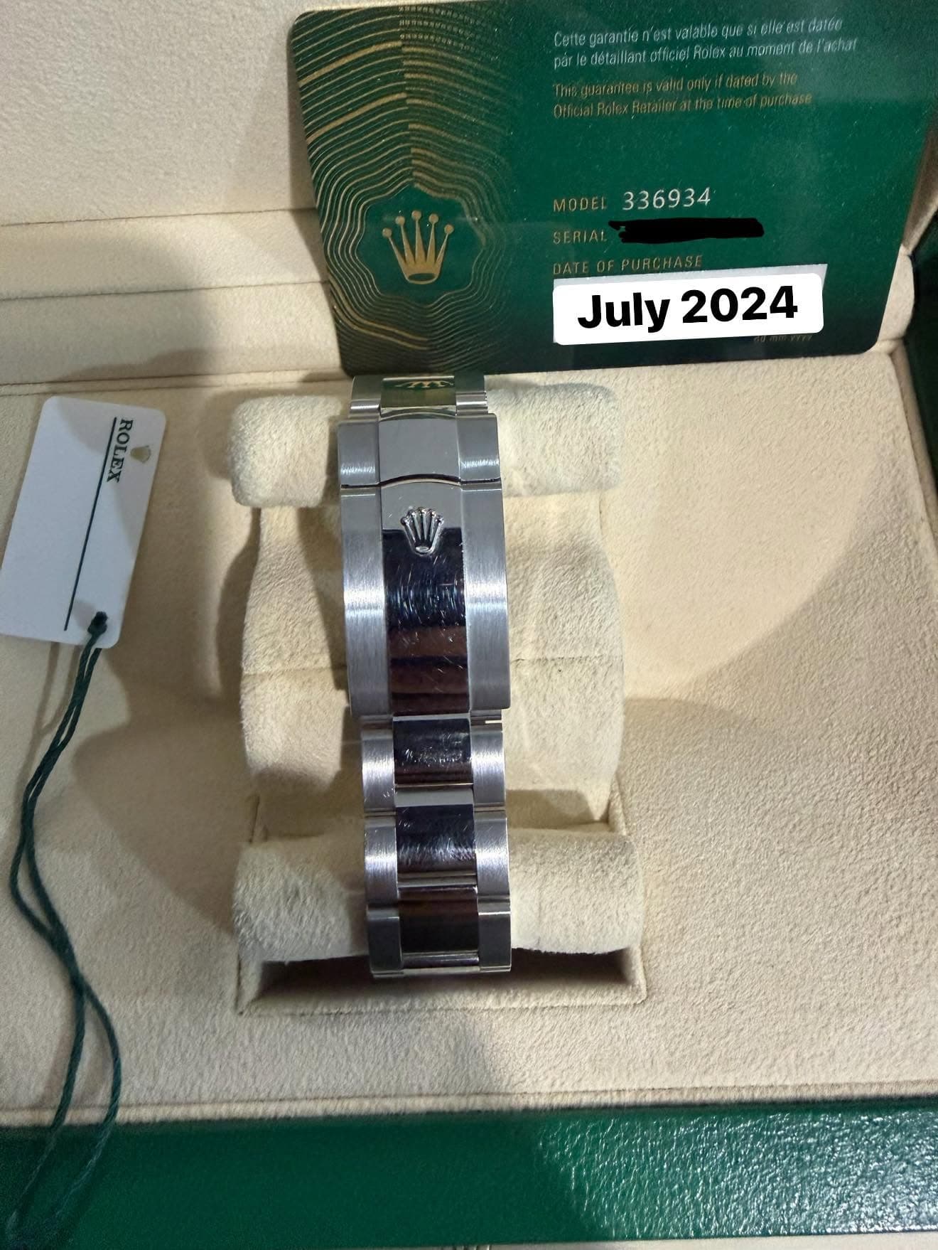 May be an image of wrist watch and text