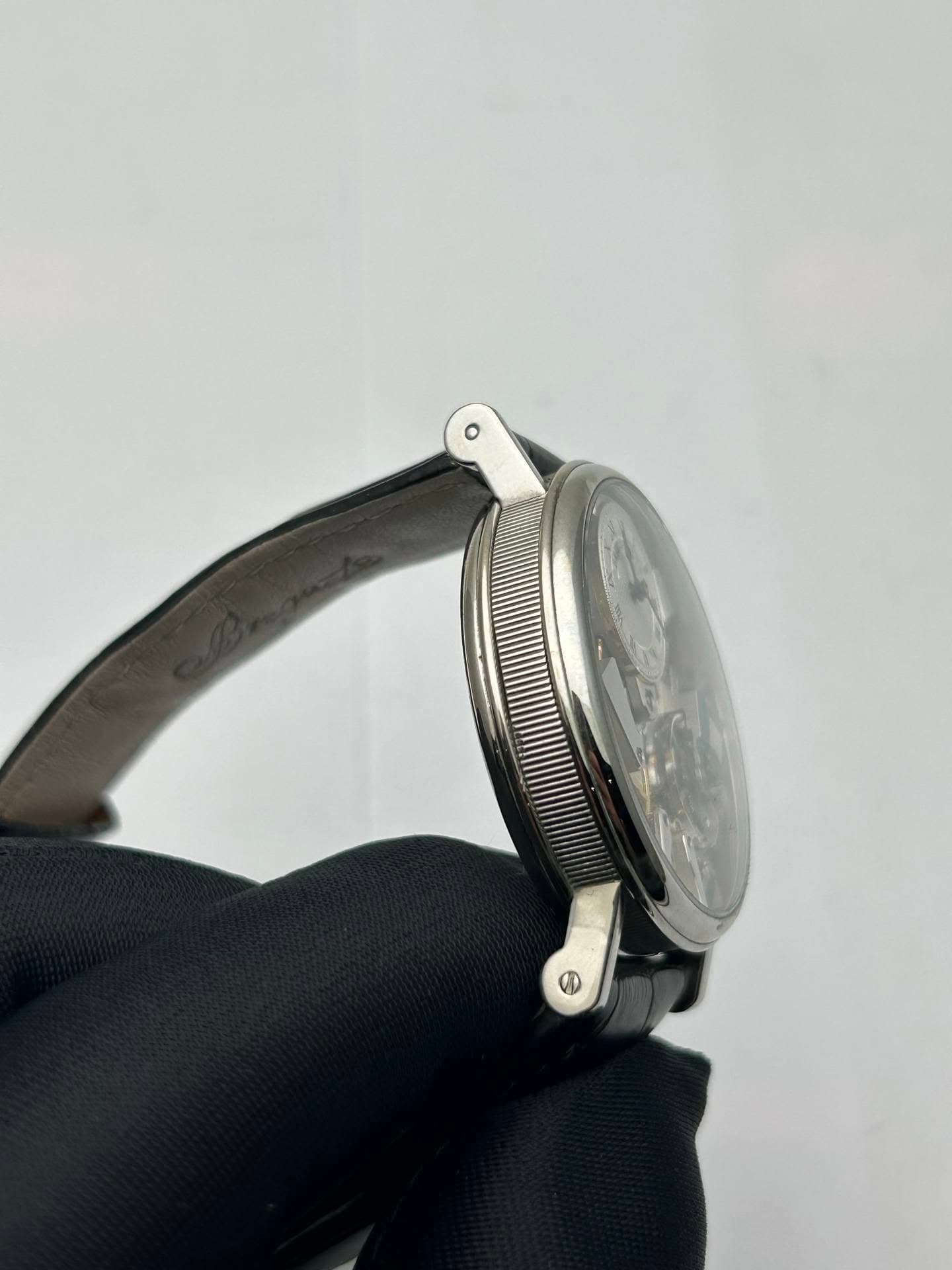 May be an image of wrist watch
