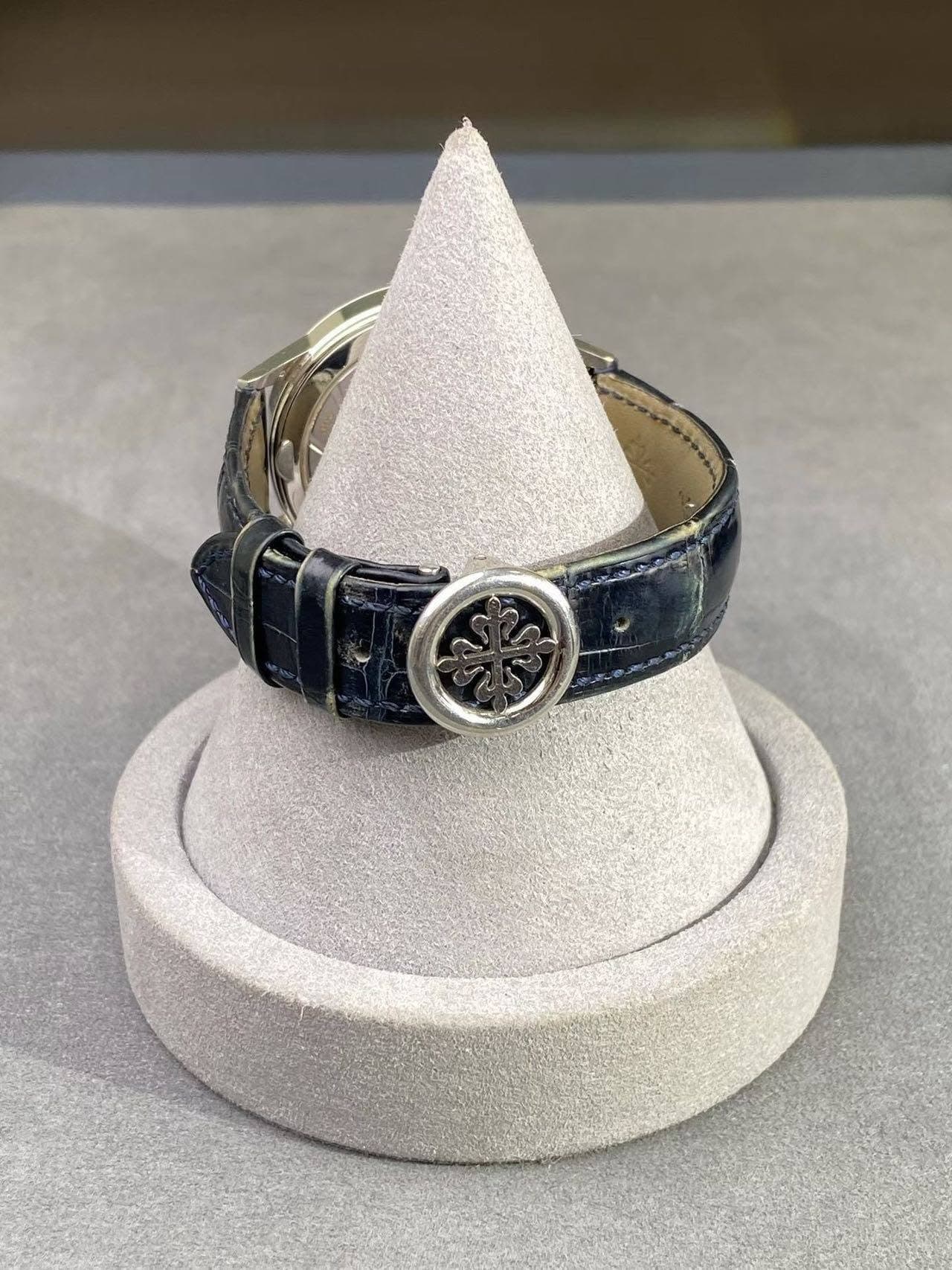 May be an image of wrist watch and ring