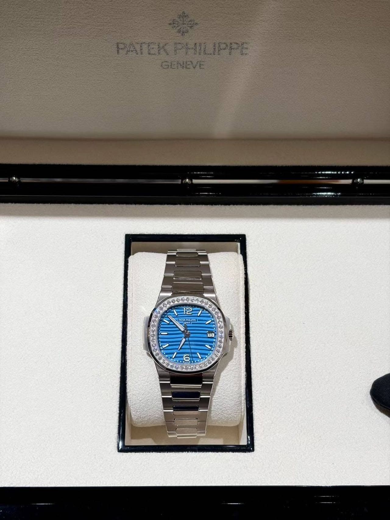 May be an image of wrist watch and text
