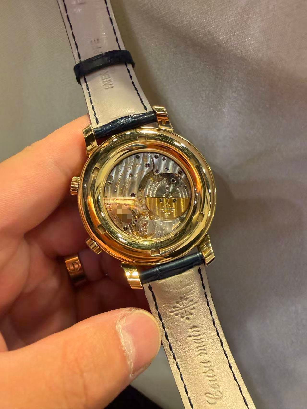 May be an image of wrist watch