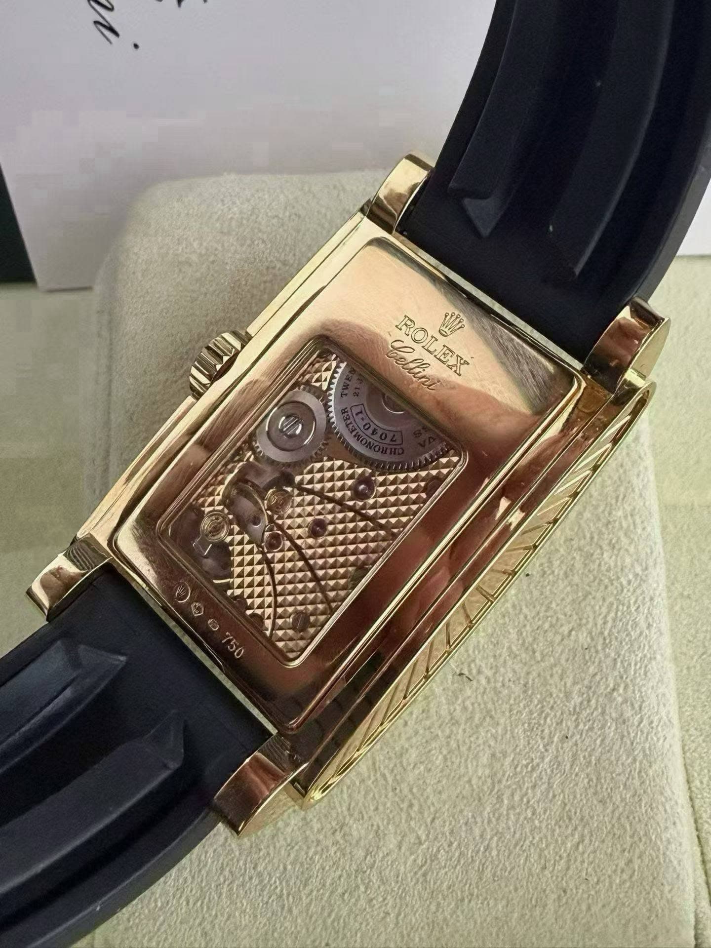 May be an image of wrist watch and text