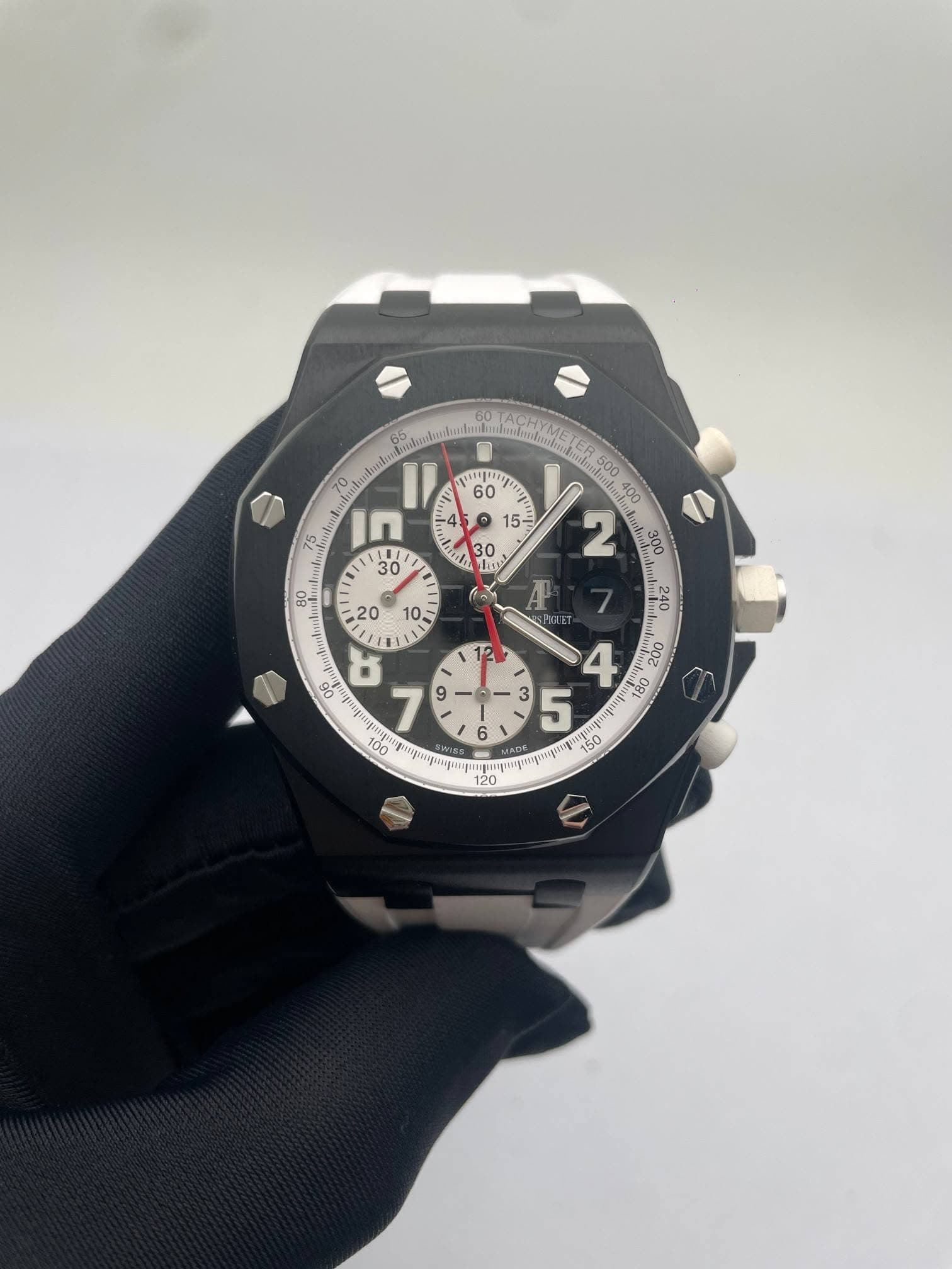 May be an image of wrist watch and text