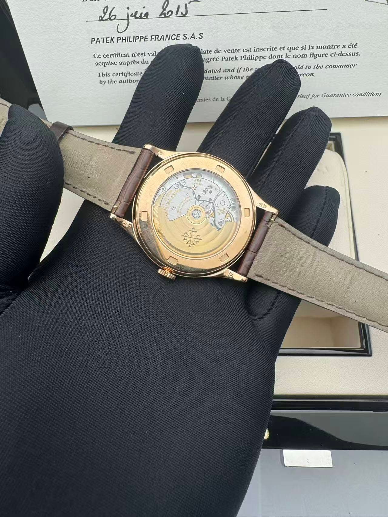 May be an image of wrist watch and text that says '26 juia נושל PATEK PHILIPPE FRANCE S.A.S Ce certificat n'est val- acquise auprès du du This certificate by the autbor la…