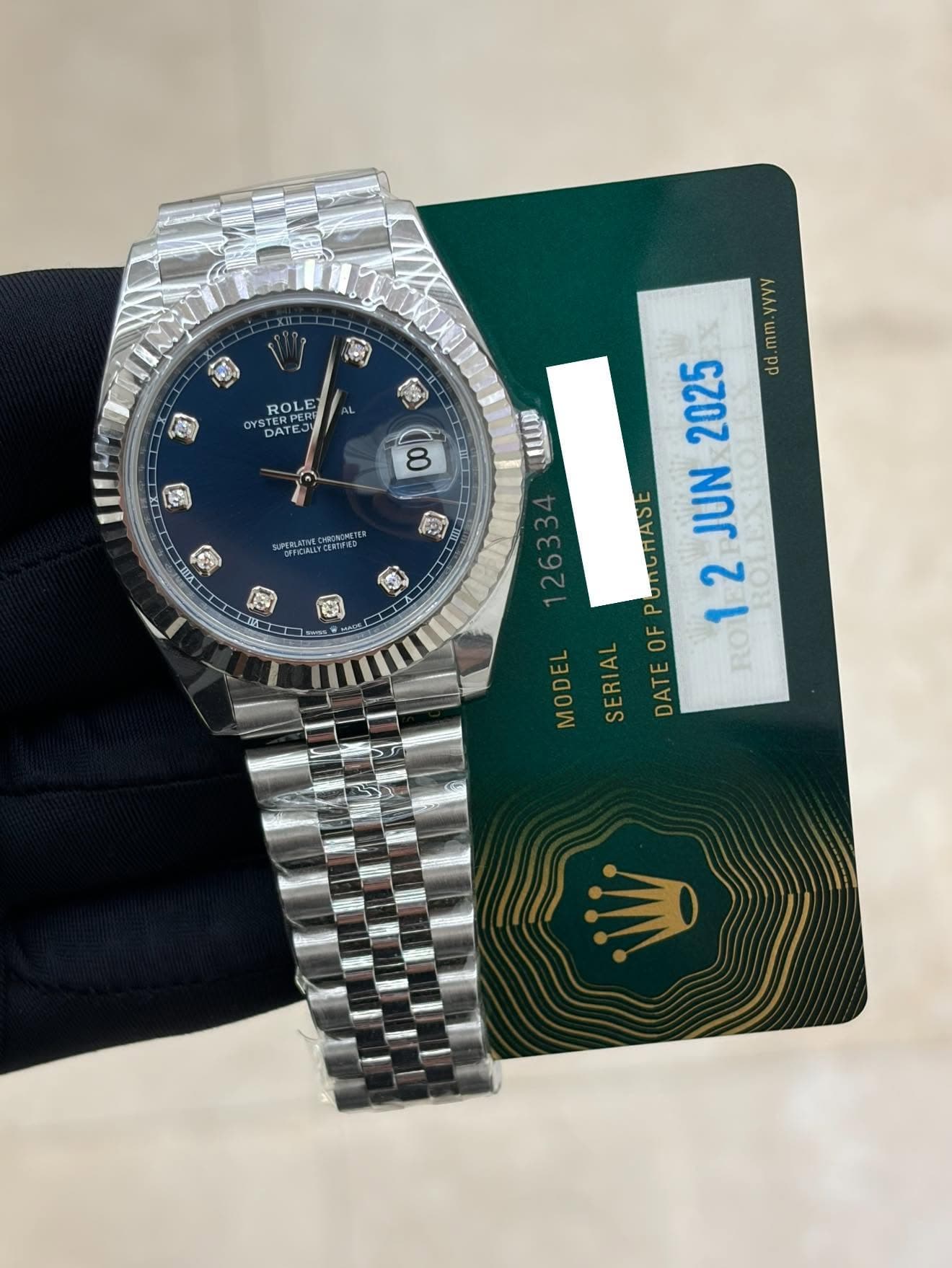 May be an image of wrist watch and text that says 'ROLE OLE DATE TAPE TERPE 한T STER yyyy mm do ማ 8 สา SFEW.ATNECE OPOATC TEUS A ® URC S ONCHASE 12JUN 1 JUN P 12 EL RO MODE SERIAL…
