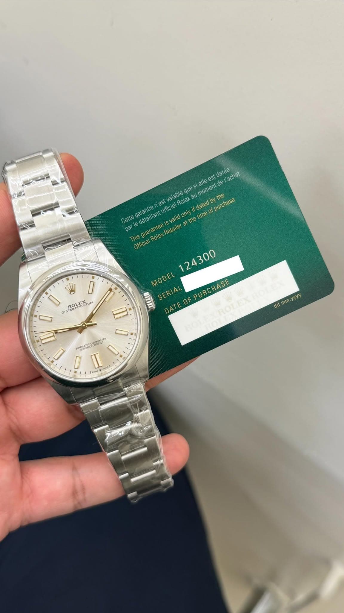 May be an image of wrist watch and text