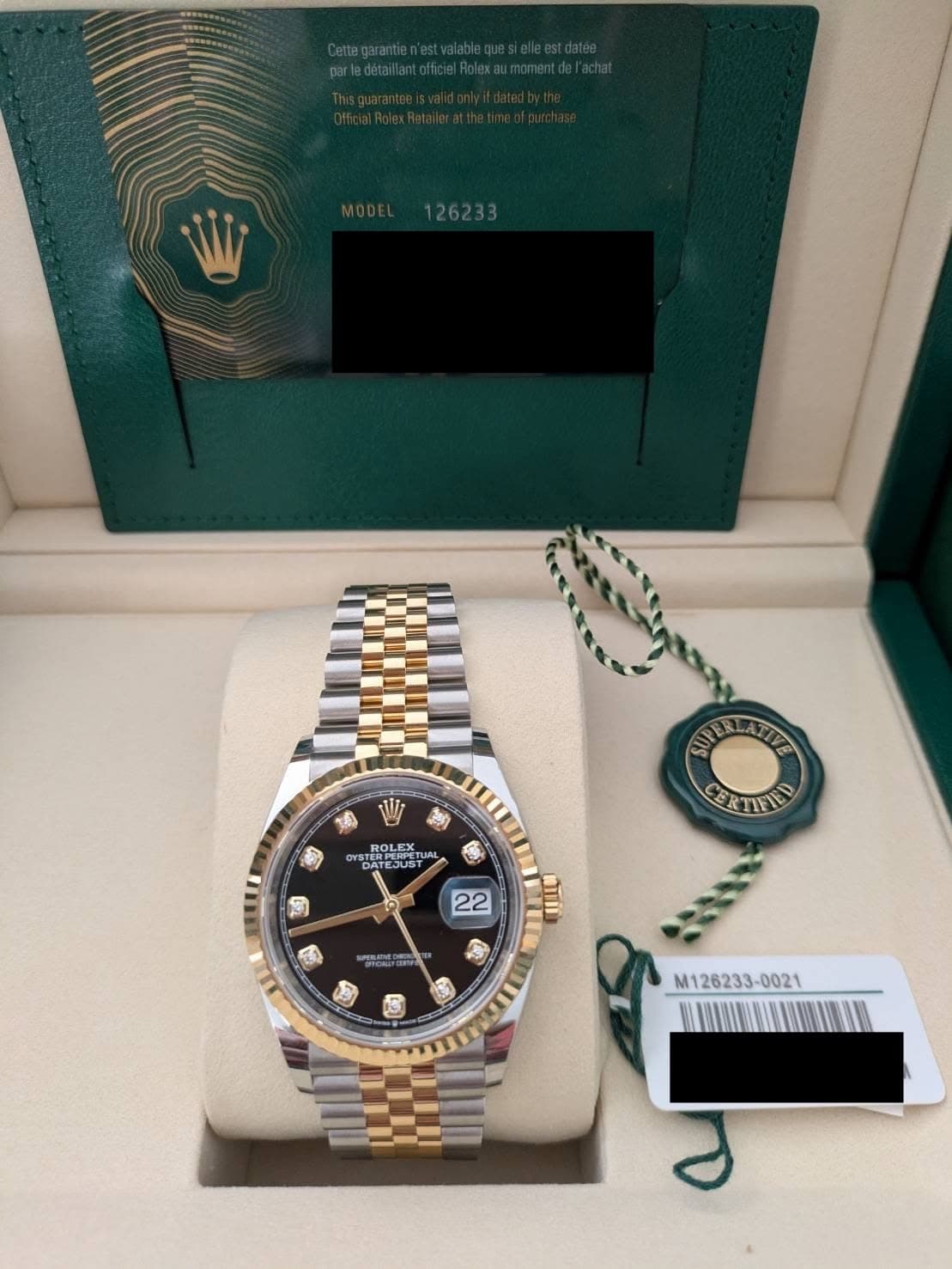May be an image of wrist watch and text that says 'SUPE SU STIRFATTE ATIVE ERTIFED ROLEX ROLEX YSTEN DATEJUS ATE JUST 2 22 ΜЛ சாய் Chear S 3 3 M126233- '