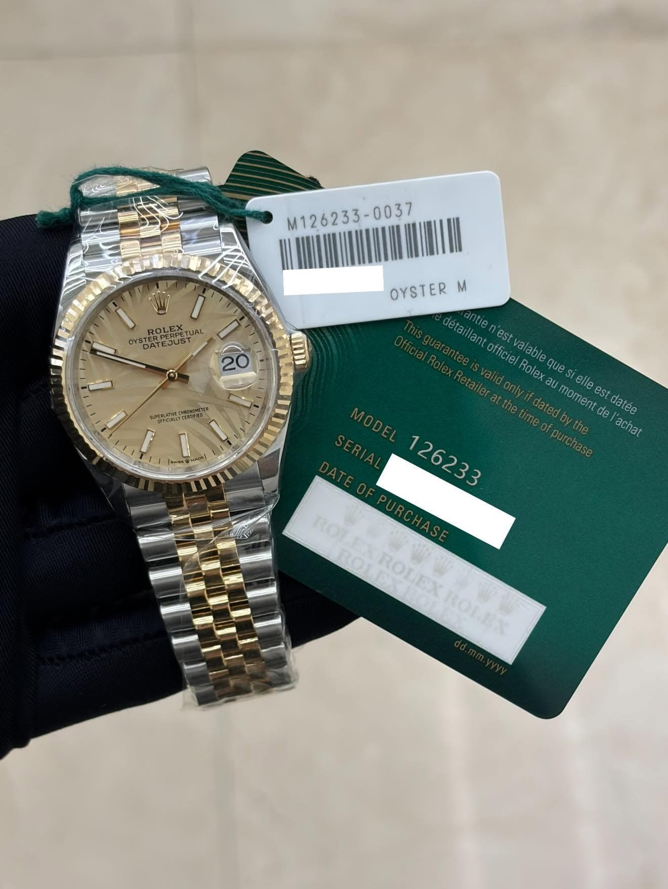 May be an image of wrist watch and text that says 'M126233-0037 m1 M126233- ROLE OLE STERPERTET RPE UAL TT 20 ้เท 3 - OYSTER M détaillan ntien officie Rolex alable que um elle…