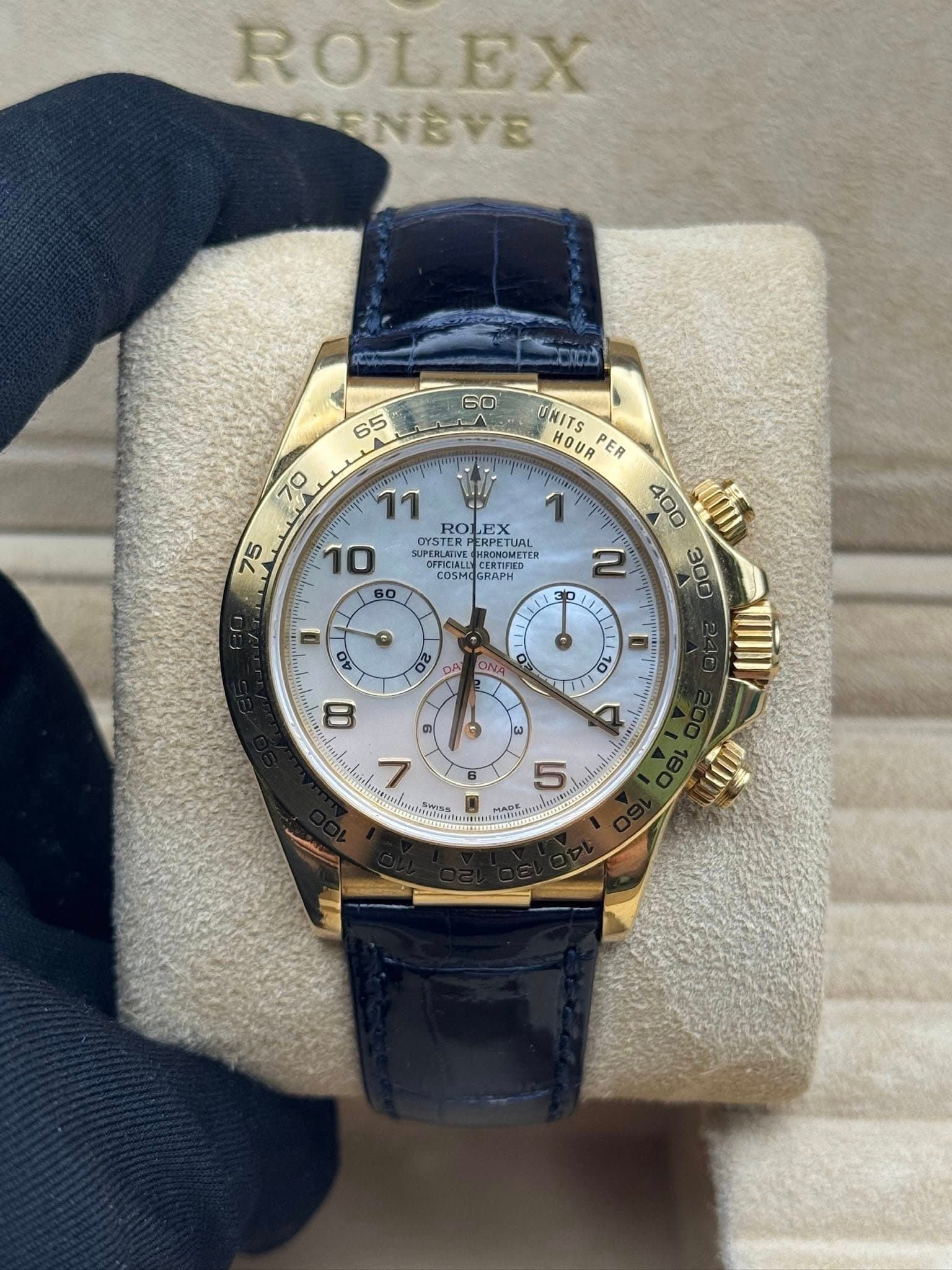 May be an image of wrist watch and text