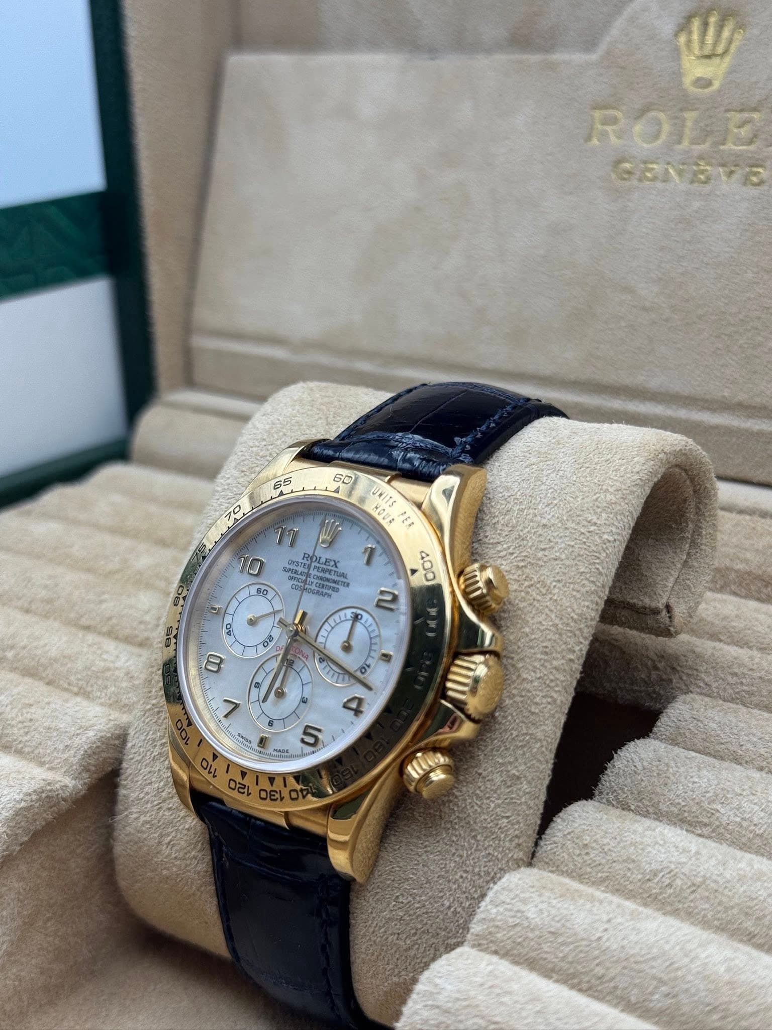 May be an image of wrist watch and text