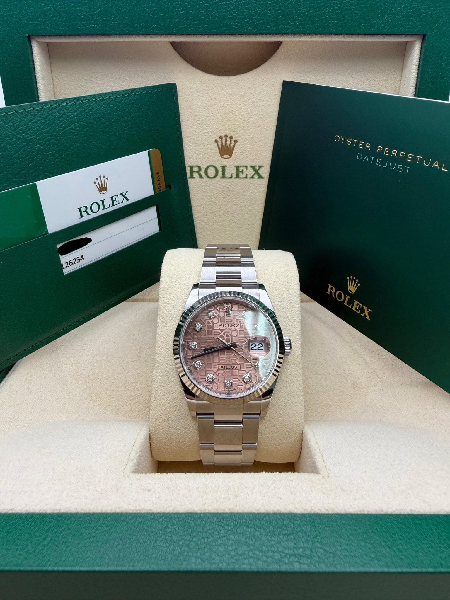 May be an image of wrist watch and text that says 'OYSTER ROLEX ROLEX ROLEX 26234 會 BROLEXI 4 22 תבכודר お'