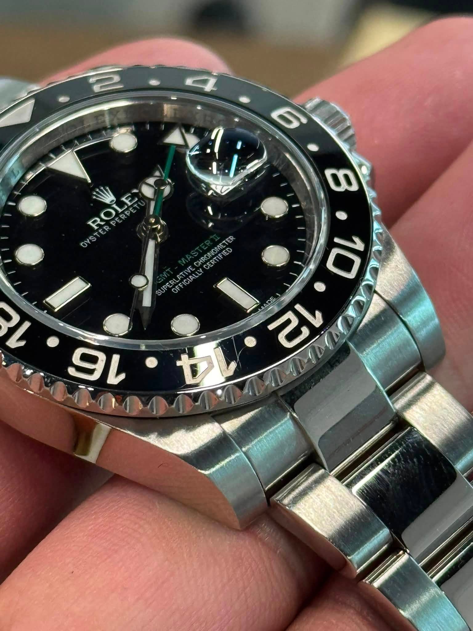 May be an image of wrist watch and text that says '6 ROLE ROLE TES か・こ ብብብለ ርሂ'