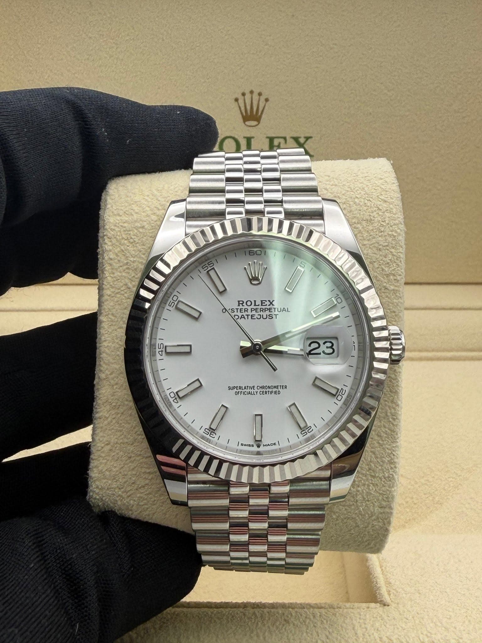May be an image of wrist watch and text that says 'OLFY 50 I OUSTER 0 ROLEX EX PERPET STERPERPET TUAL DATE DATEJUST EJUS SUPERLATIWE CHRONOMETER OFFICIALLY FICIALLYCERTFIEI…