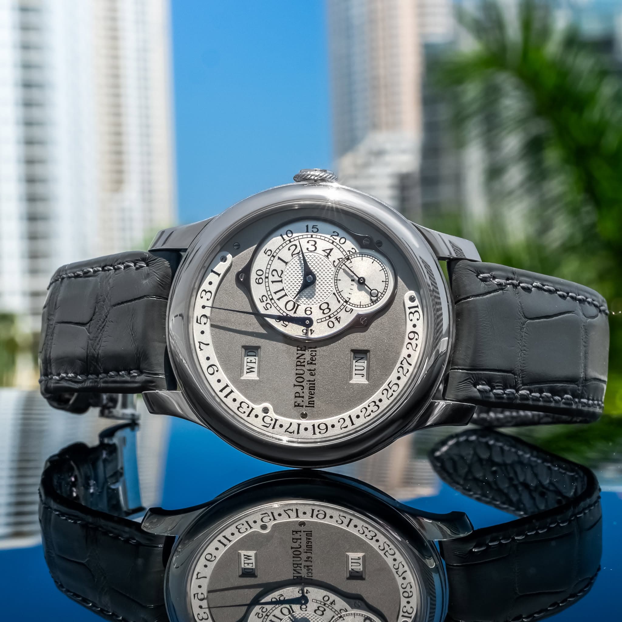 May be an image of wrist watch and text