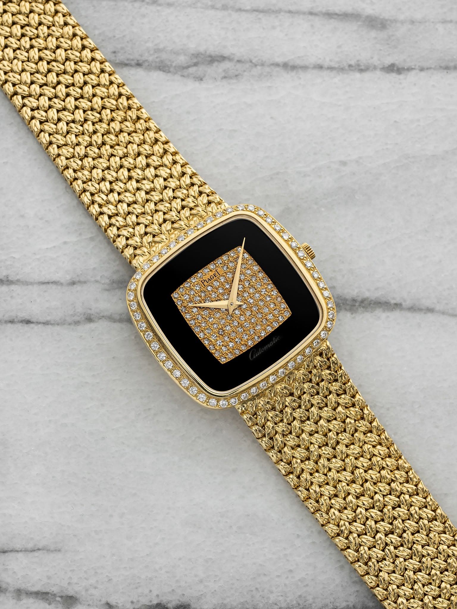 May be an image of digital watch and jewelry