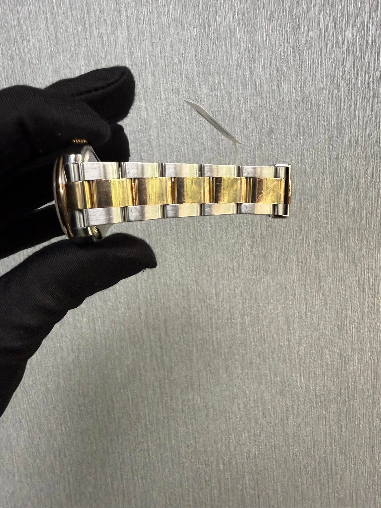 May be an image of wrist watch