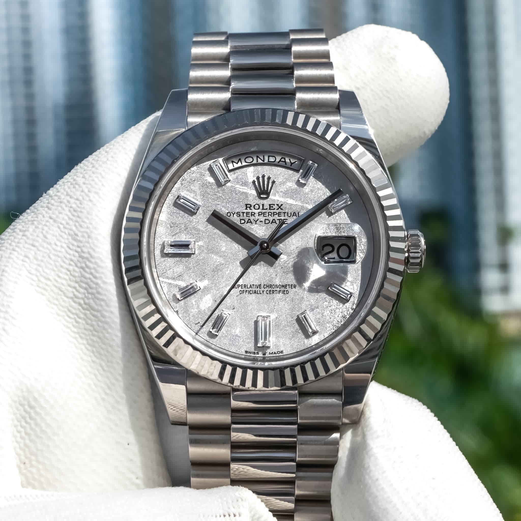 May be an image of wrist watch and text